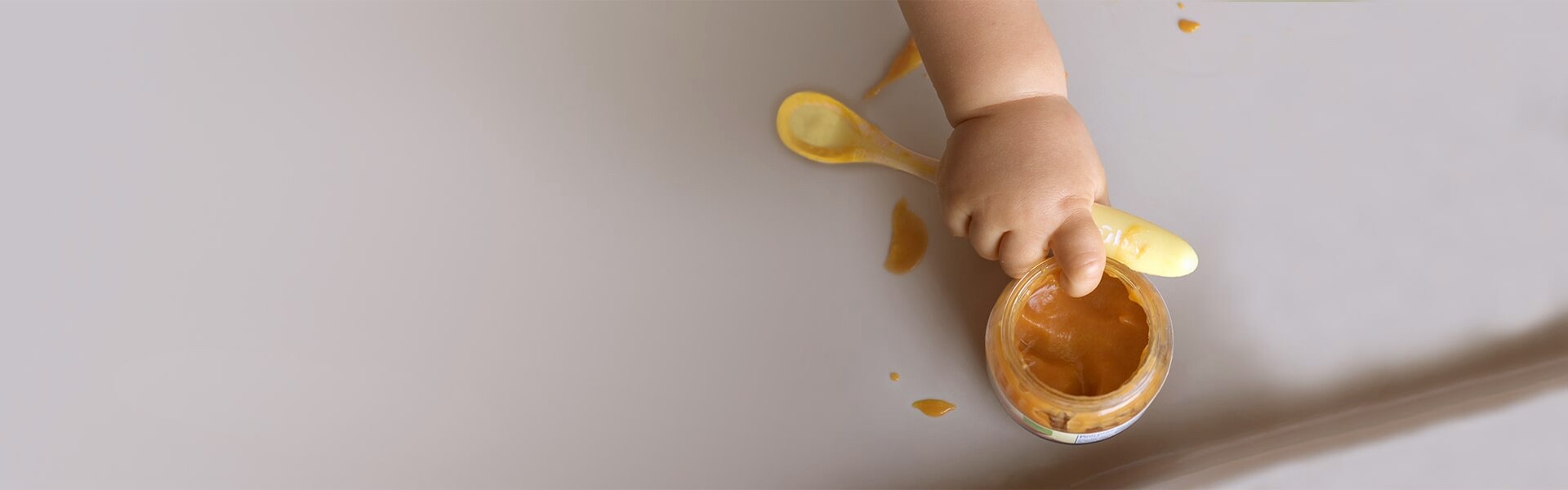 Baby reaching for food