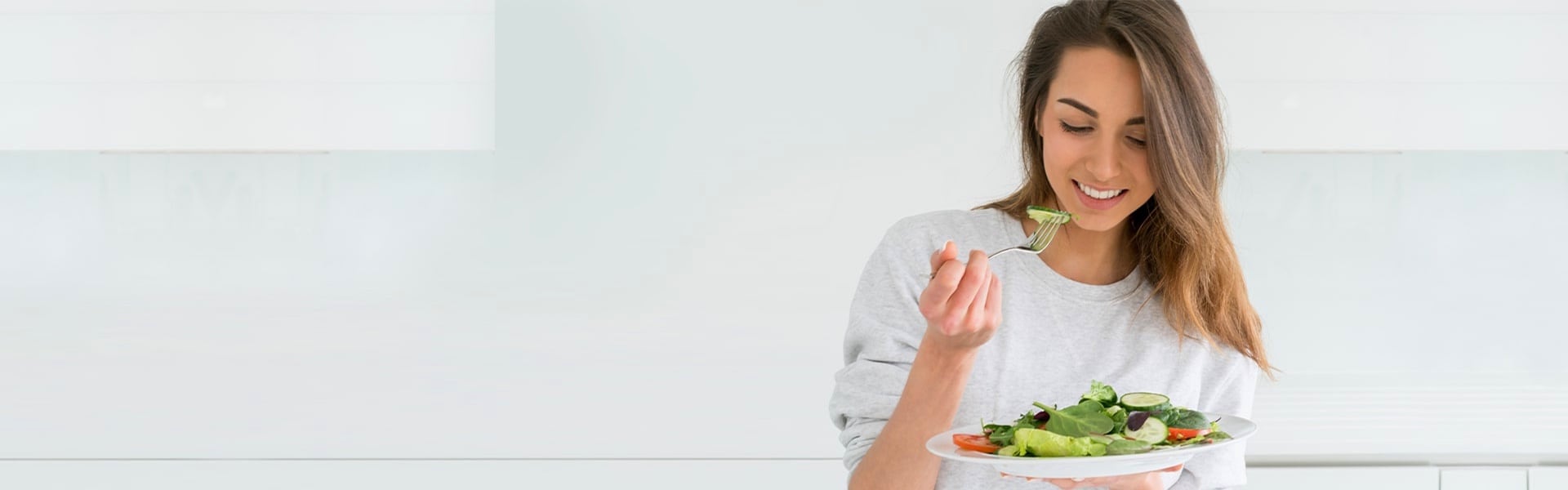 Woman eating a salad
