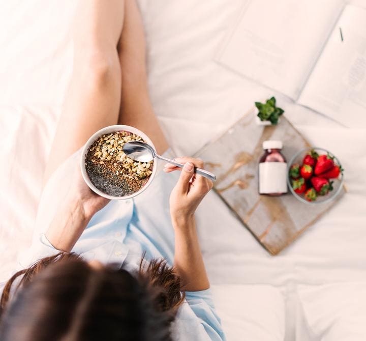 Woman eating breakfast
